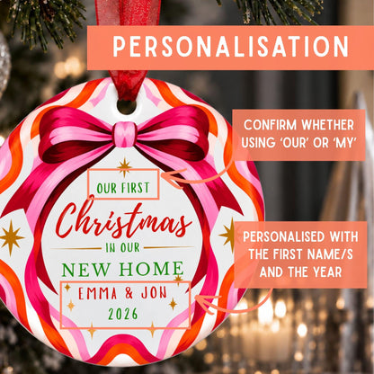 Personalized Christmas ornament with a colorful striped pattern, a large pink bow illustration, and custom text reading 'Our First Christmas in our New Home Emma & Jon 2026,' with callout boxes explaining personalization options.