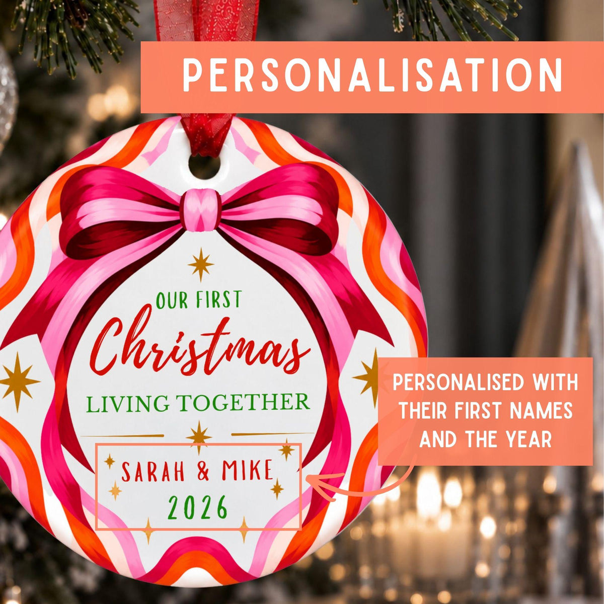 Personalized Christmas ornament featuring a festive red, pink, orange, and white pattern with a large bow illustration. The ornament is custom printed with the text 'OUR FIRST Christmas TOGETHER', 'SARAH & MIKE', and '2026'.
