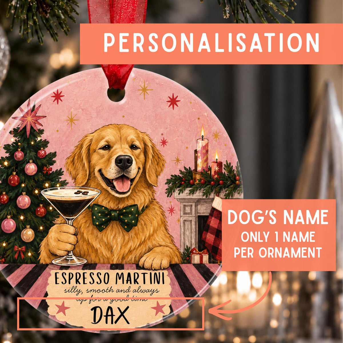 Close-up of a personalised ceramic Golden Retriever Christmas bauble featuring a happy golden-coloured dog wearing a green bow tie and holding an Espresso Martini. The pink festive background includes a decorated Christmas tree, fireplace, hanging stocking and glowing candles, with the dog's name Dax printed beneath the artwork.