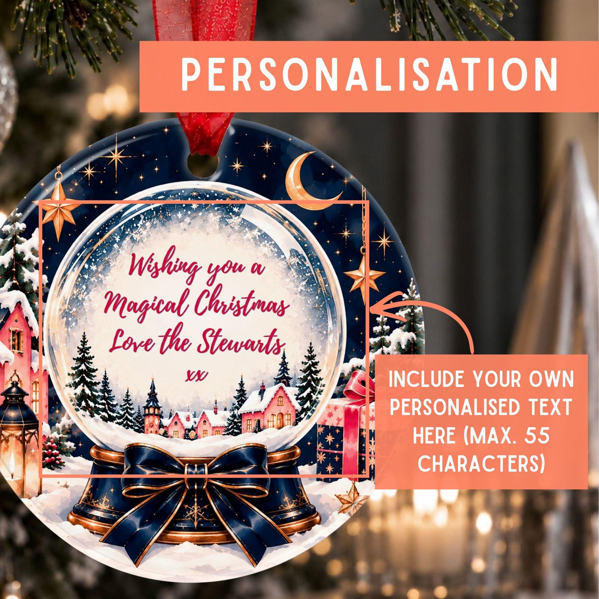 Personalized round Christmas ornament mockup hanging on a tree, with a red ribbon loop, a dark navy night-sky scene, snowy village houses, stars, and a large glass snow globe center containing custom red text. Orange overlay text says PERSONALISATION and includes custom text area.
