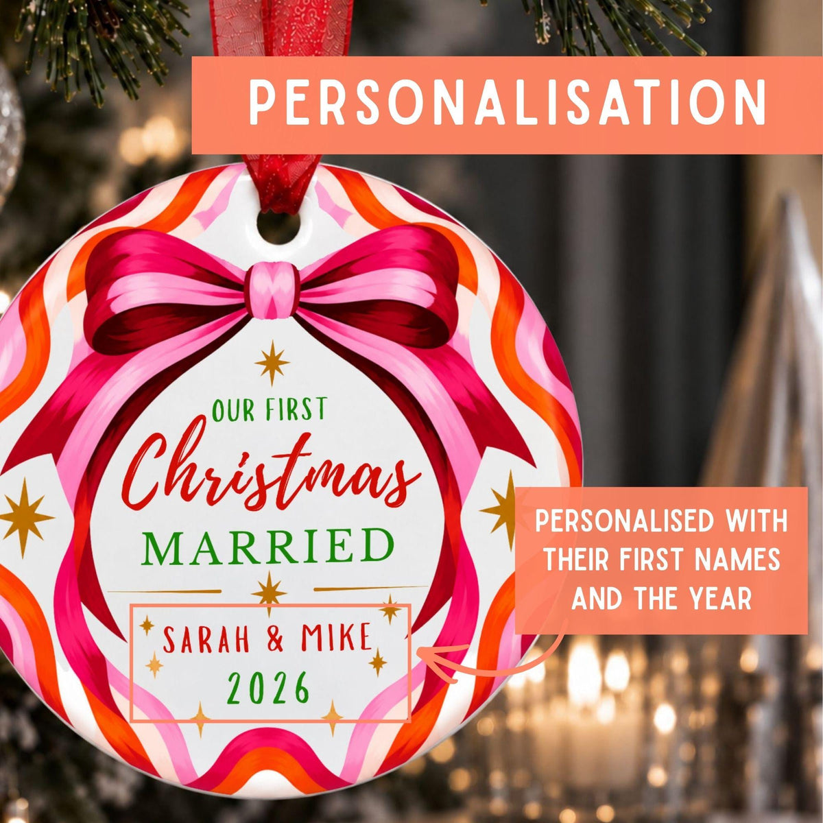 Personalized Christmas ornament featuring a colorful wavy pattern in pink, orange, red, and white, with a large pink bow illustration. The center reads 'Our First Christmas MARRIED Sarah & Mike 2026' in red and green text.
